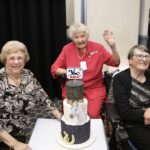 Margaret Norman, Eileen Davis and Jan Pike with 50 year celebration cake