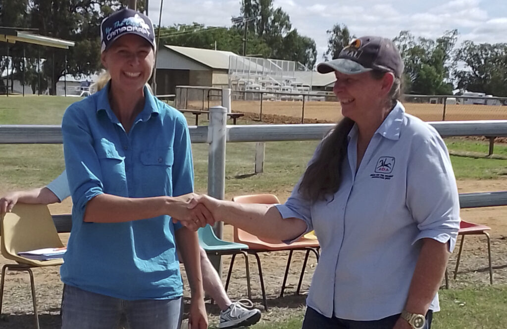 RDA team member congratulating certified coach